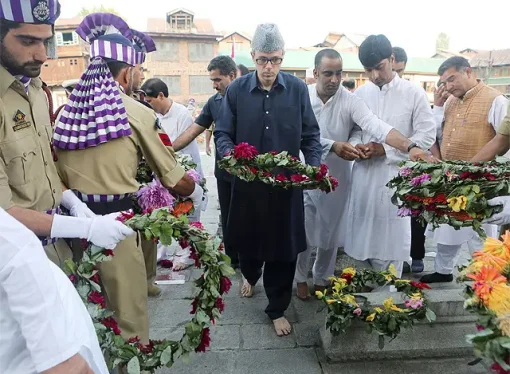 Omar Abdullah Scales Wall to Pay Tribute at Srinagar’s Martyrs’ Graveyard Amid Restrictions