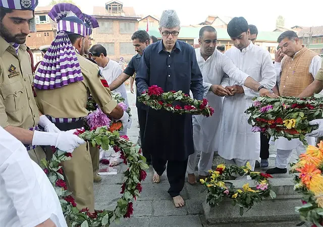 Omar Abdullah Scales Wall to Pay Tribute at Srinagar’s Martyrs’ Graveyard Amid Restrictions